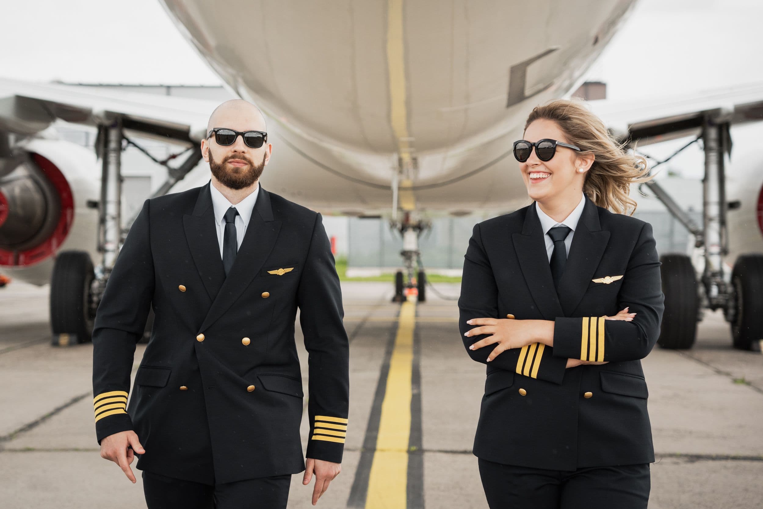 Two pilots near an aircraft