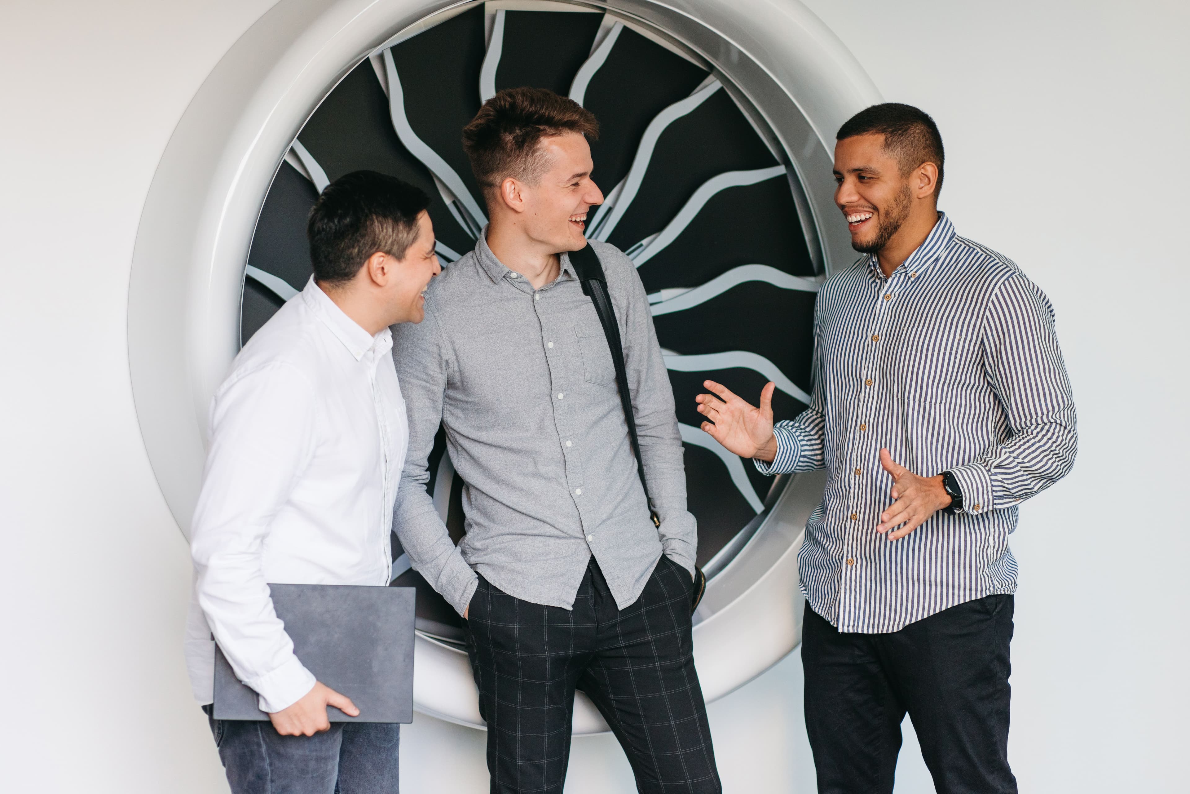 Three people chatting